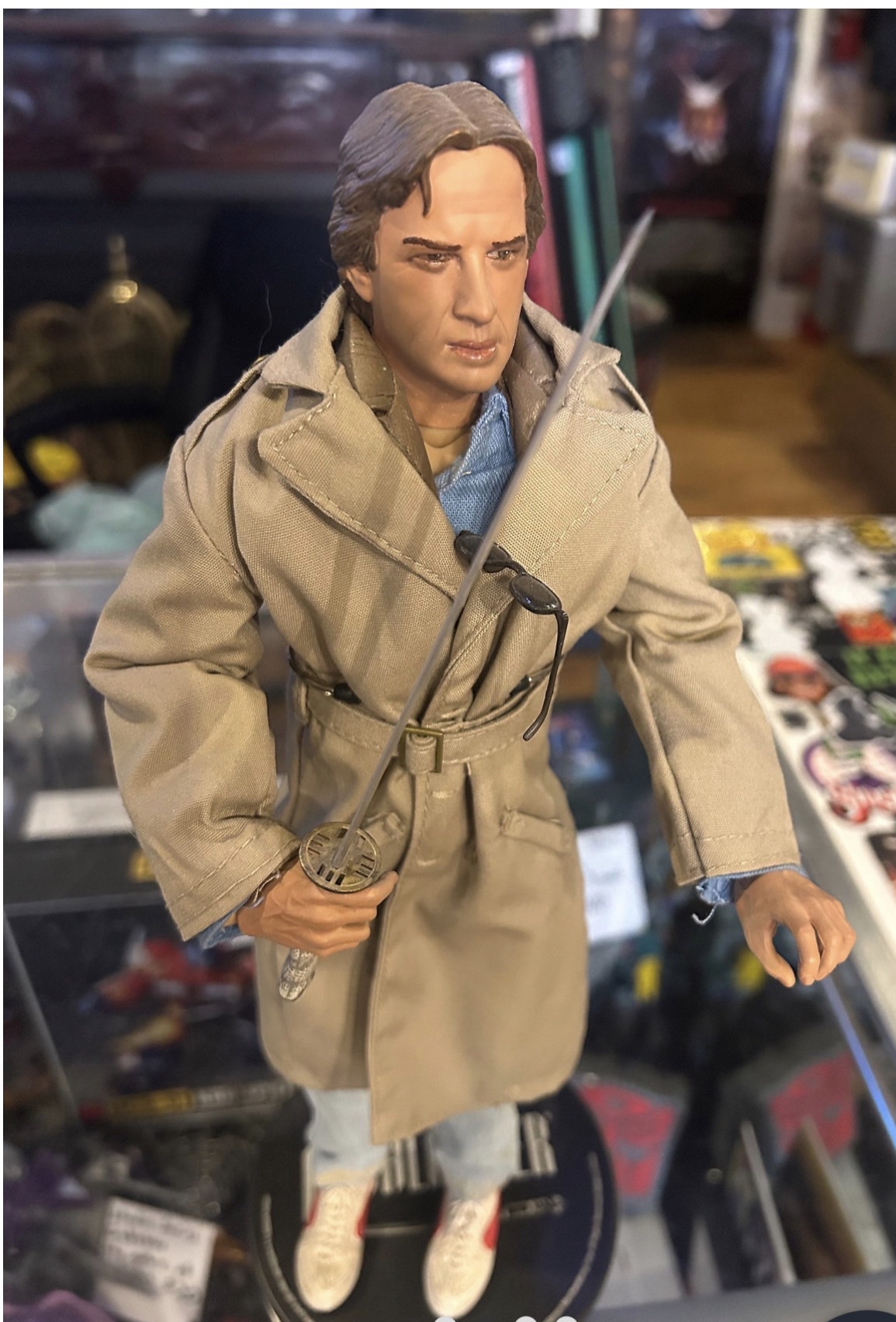 Connor MacLeod 1/6 figure in tan trench coat holding katana
